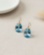 oval blue gemstone gold earrings