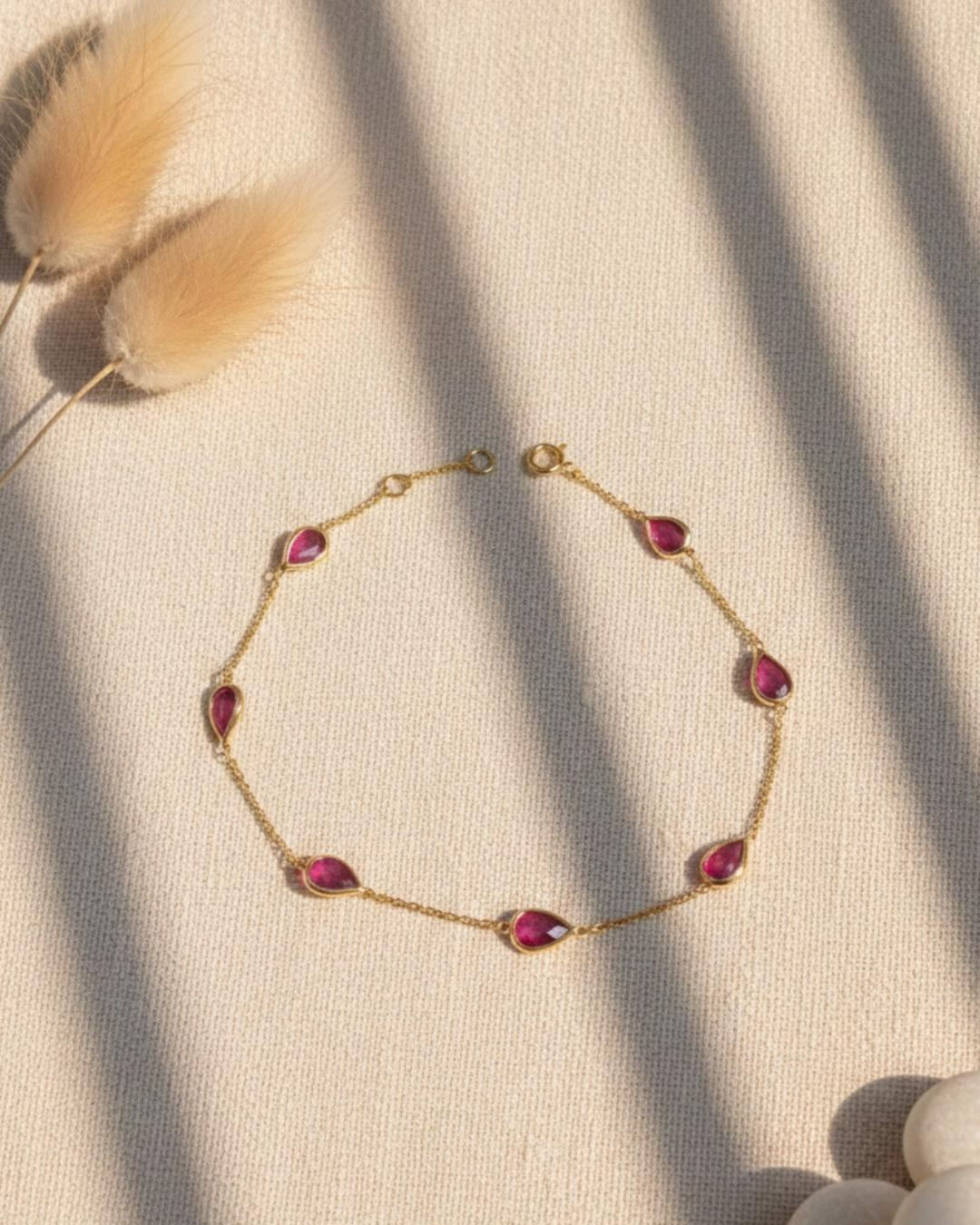 ruby pear gold station bracelet in solid gold