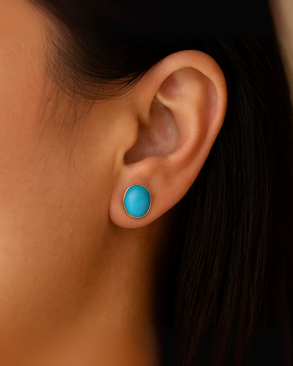 natural turquoise oval stud earrings set in 14k gold simple gemstone jewelry