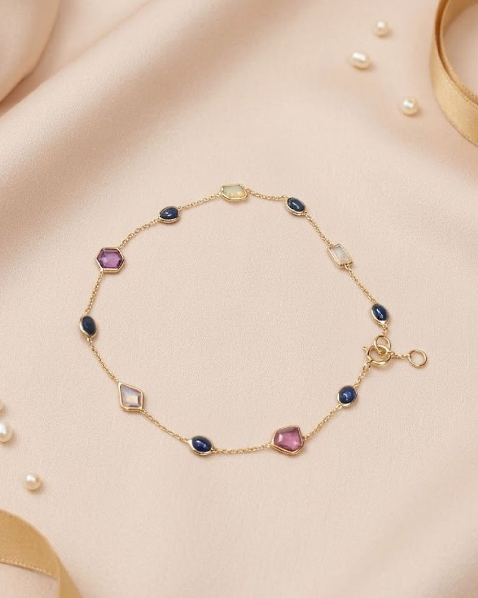 multi sapphire station bracelet in solid gold