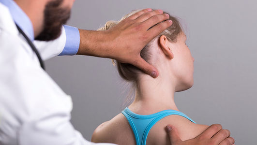 Doctor and patient stretching neck