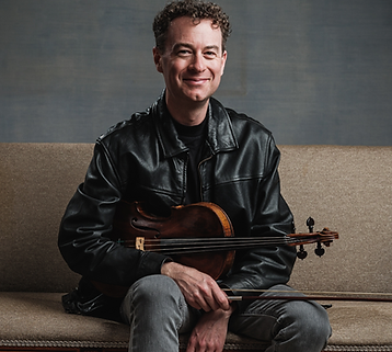 Violist Jason Fisher is a founding member and co-artistic director of A Far Cry. A child of the Northwest, Jason grew up in Seattle and is a proud enthusiast of rainy days. He first picked up an instrument at age 11 in elementary school when the orchestra teacher told him they needed “somebody to play the viola.” Jason went on to study with Helen Callus, Victoria Chiang, Katherine Murdock, and Roger Tapping, and is a graduate of Peabody Conservatory, and the Longy School of Music.
A Carnegie Hall Fellow and a Peabody Singapore Fellow, he has toured Europe, Asia, Kazakhstan, and the Kyrgyz Republic and has given concerts at Vienna Musikverein, Singapore Esplanade, The Kennedy Center, and Carnegie Hall. Jason has performed with Pink Martini, Jake Shimabukuro, Itzakh Perlman, Yo-Yo Ma, Renée Fleming, Kiri Te Kanawa, and with members of the Florestan Trio, and the Æolus, Brentano, Cleveland, Emerson, Mendelssohn, and St. Lawrence String Quartets.
Principal violist of Boston Baroque, Jason plays period viola with the Handel and Haydn Society, Trinity Baroque Orchestra, The English Concert, ACRONYM Ensemble, The Thirteen, Sound Salon, Teatro Nuovo, Opera Lafayette, Relic, and The Sarasa Ensemble. He has spent recent summers on viola and viola d’amore at the Staunton Music Festival, Oregon Bach Festival, Connecticut Early Music Festival, and the Aston Magna Music Festival. Jason is on viola faculty at The Rivers School Conservatory where he also serves as Director of the Chamber Music Lab. He is the Artistic Program Lead for Portland Summer Ensembles, a chamber music workshop for advanced-level teenagers in Oregon. Jason plays on an English viola by Richard Duke, 1768, and a recently commissioned copy of that instrument in period setup by Timothy Johnson.