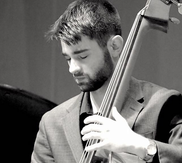 Matt Stavrakas is from Medfield, Massachusetts, and began playing the upright bass at age 15. After participating in the nationwide Essentially Ellington competition at Lincoln Center with the Medfield High School jazz band, Matt knew he wanted to pursue a career in music.
Matt graduated from the New England Conservatory of Music in 2014, where he studied under Cecil McBee, John McNeil, Dave Holland, and Frank Carlberg, among others. Matt also studied classical technique under Don Palma at NEC, and after graduating from the conservatory continued his studies under Hal Crook. Matt had the privilege of playing with Jerry Bergonzi in the fall of 2014, and has performed regularly with Jerry ever since, including a weekly live stream performance every Wednesday starting in 2020. Matt has performed with other notable musicians including George Garzone, Bob Gullotti, Billy Hart, Kenny Werner, Leo Genevese, and Gilad Hekselmen, and has performed regularly in the Boston scene since 2014.
At The Rivers School, Matt teaches ensembles, private lessons, and the color ear training course.