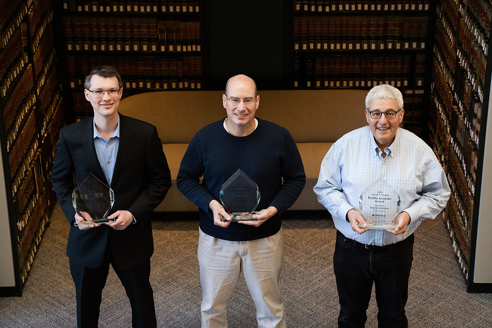 Group photo of award winners at business event