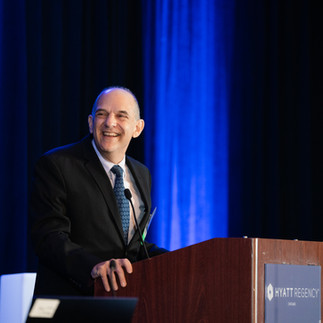 Speaker at podium corporate event