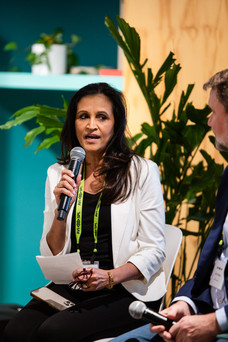 woman speaking at conference