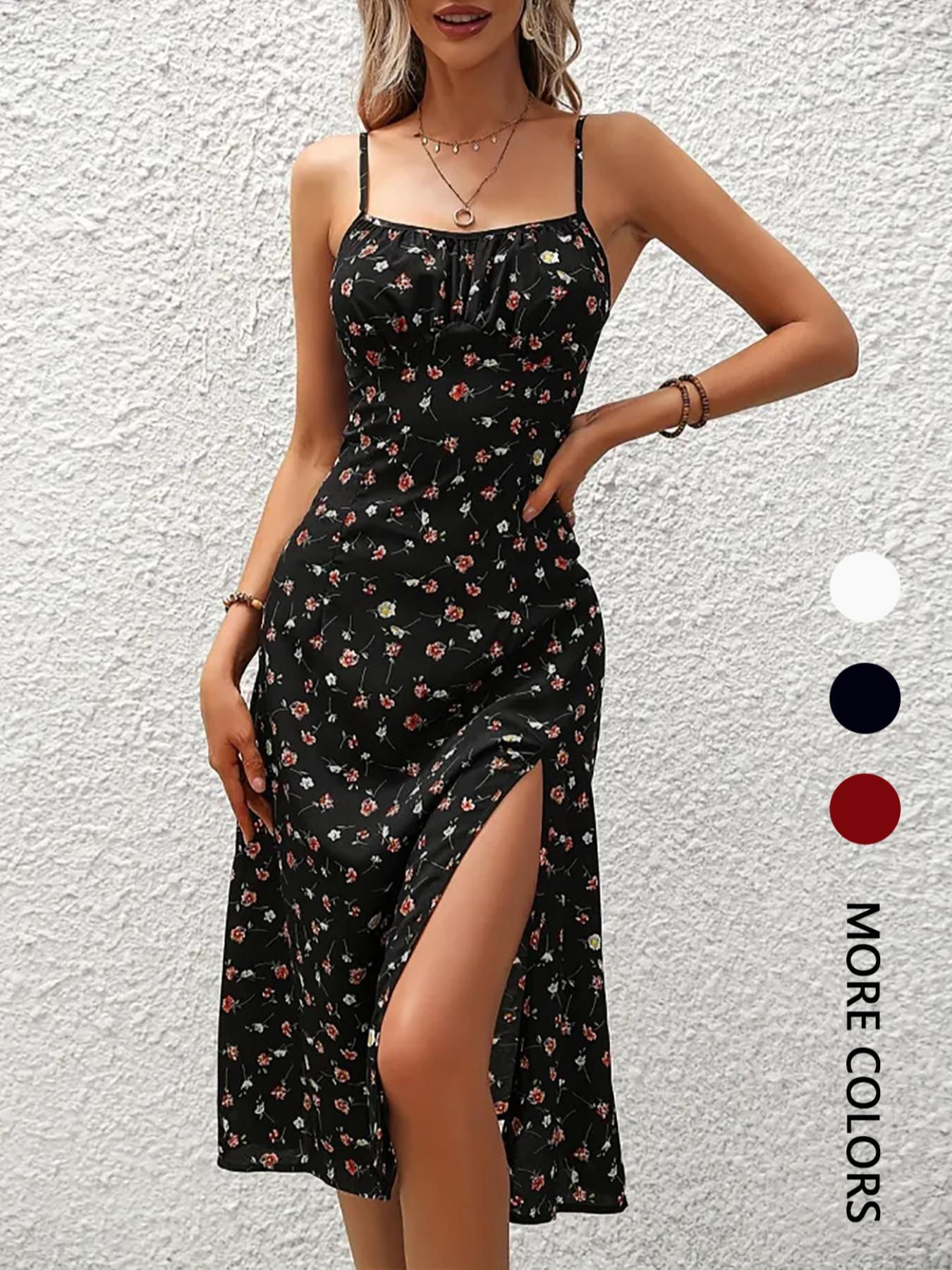 Vestido midi estilo boho, sem mangas, com estampa floral e barra assimétrica.