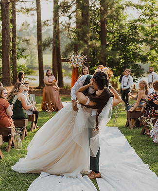 Bride and groom aisle dip