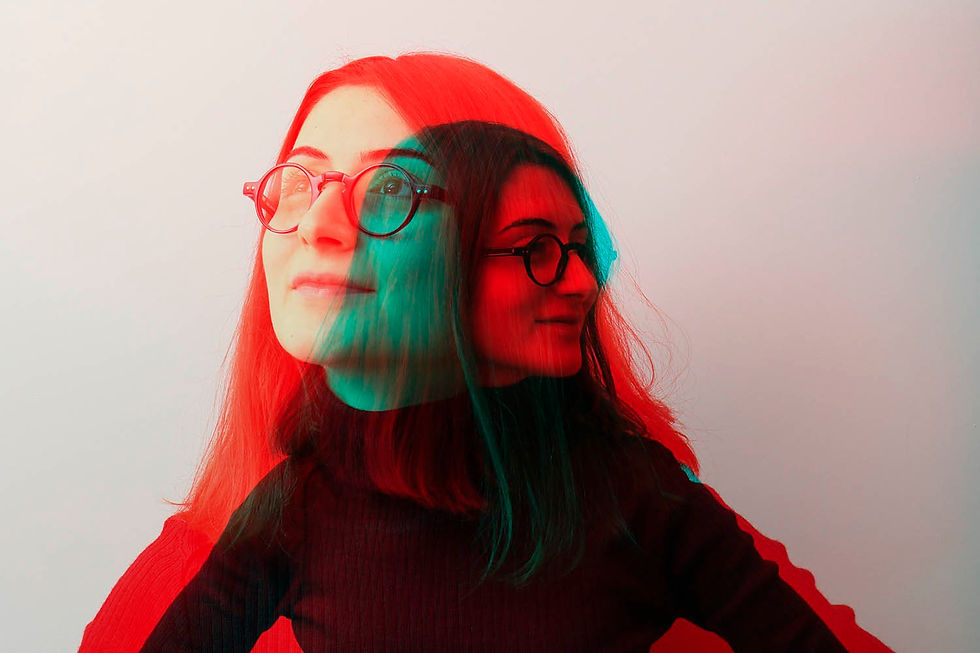 Double exposure portrait of a woman wearing glasses