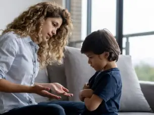 Mother comforting an angry child