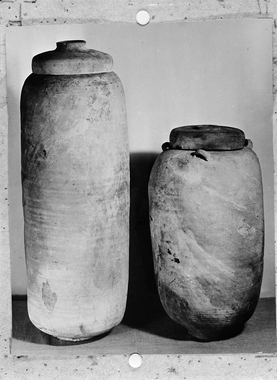 Two of the clay jars in which the Qumran scrolls were found. Source: Willem van de Poll, CC0, via Wikimedia Commons