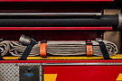 Coils of water hoses on a fire engine.jpg