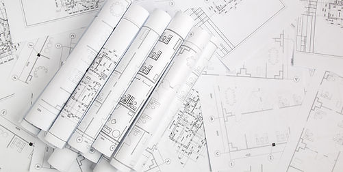 Paper architectural drawings and blueprint.jpg