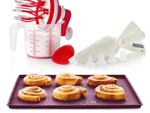 Réalisez Facilement Vos Bûches de Noël avec le Kit Pâtisserie Tupperware : Une Explosion de Saveurs