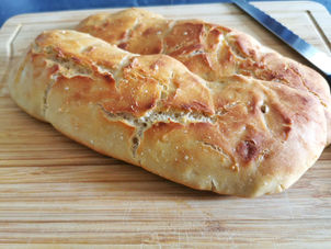 Baguettes de pain en cocotte dans l'ultra pro Tupperware