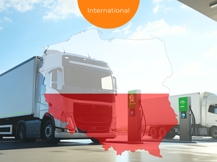 E-trucks loading on a depot. Poland Flag in the foreground.