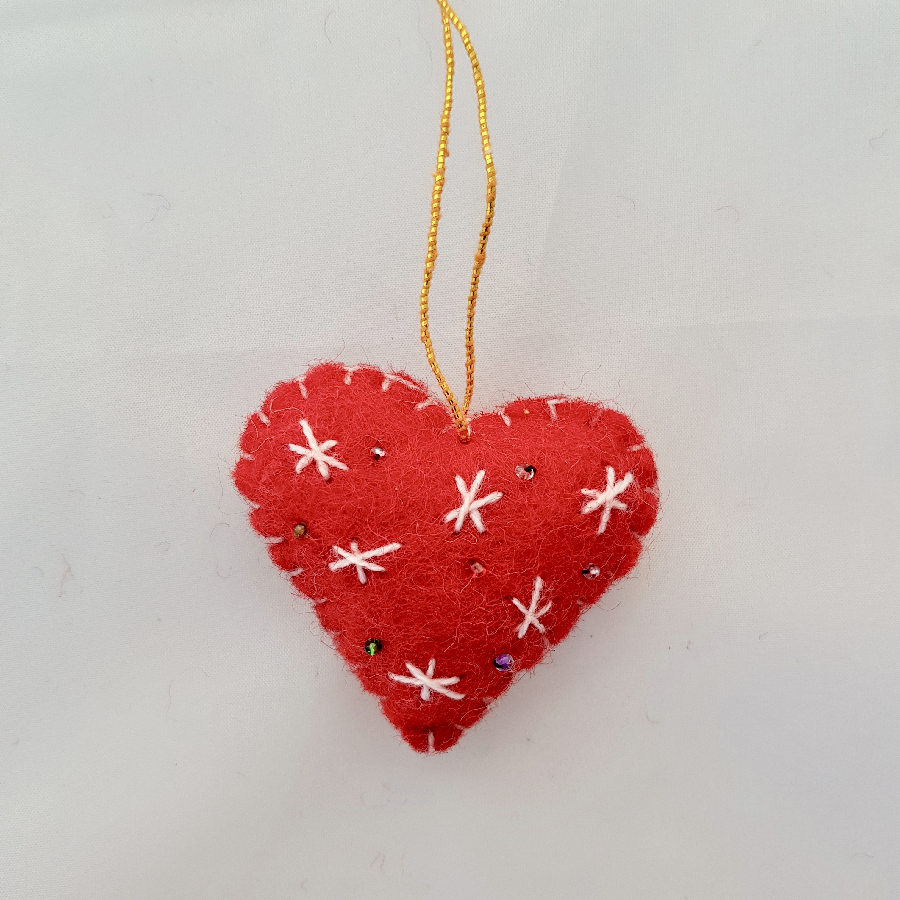 Red and white heart tree hanging.