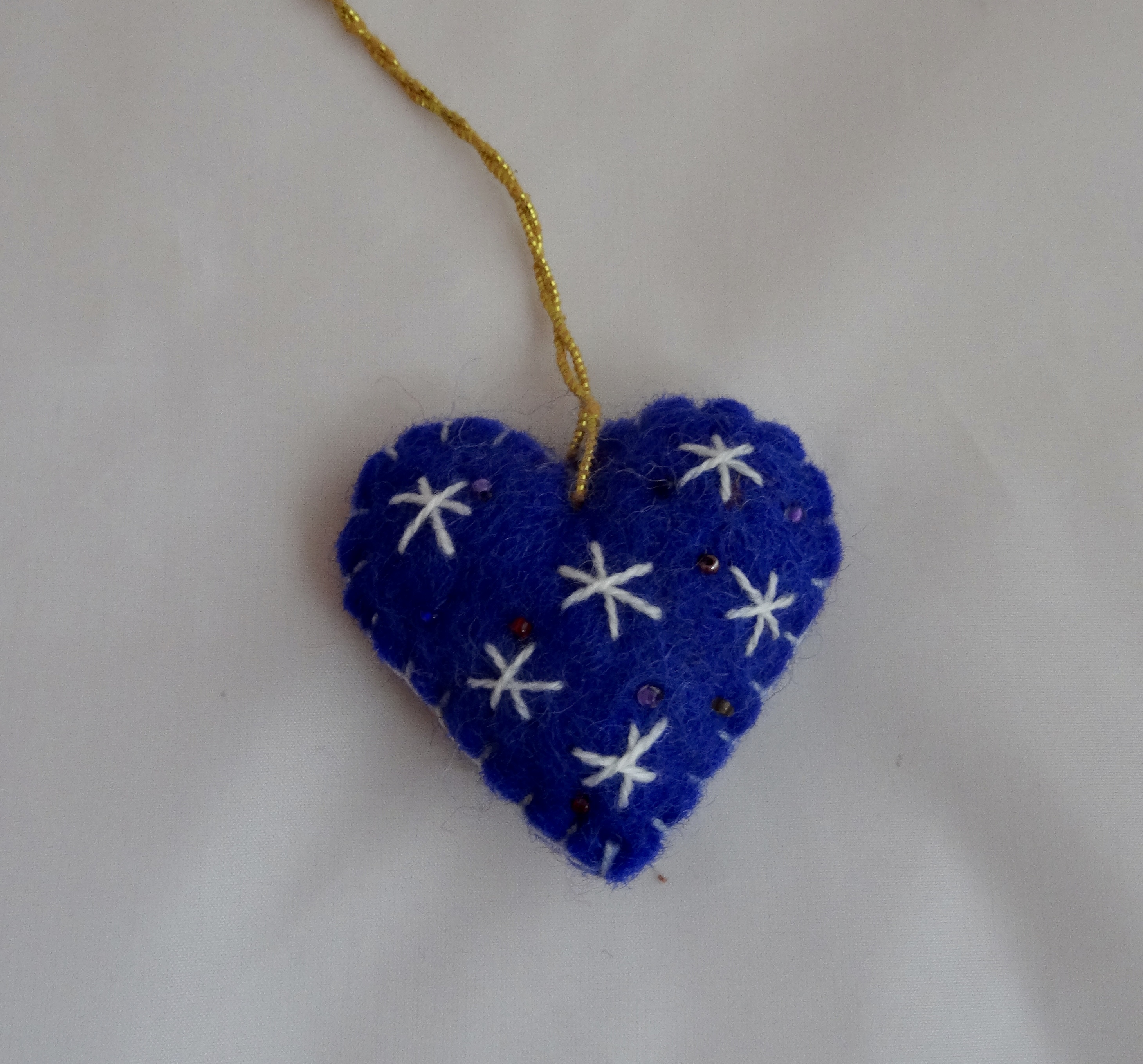 Blue and white heart tree hanging.