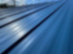 1" Nail Fin regal blue standing seam metal roof