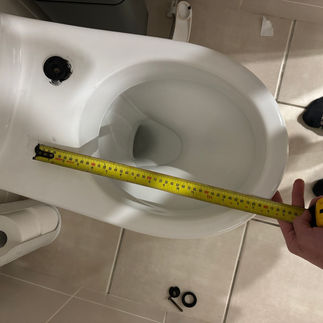 measuring-up-a-new-toilet-seat