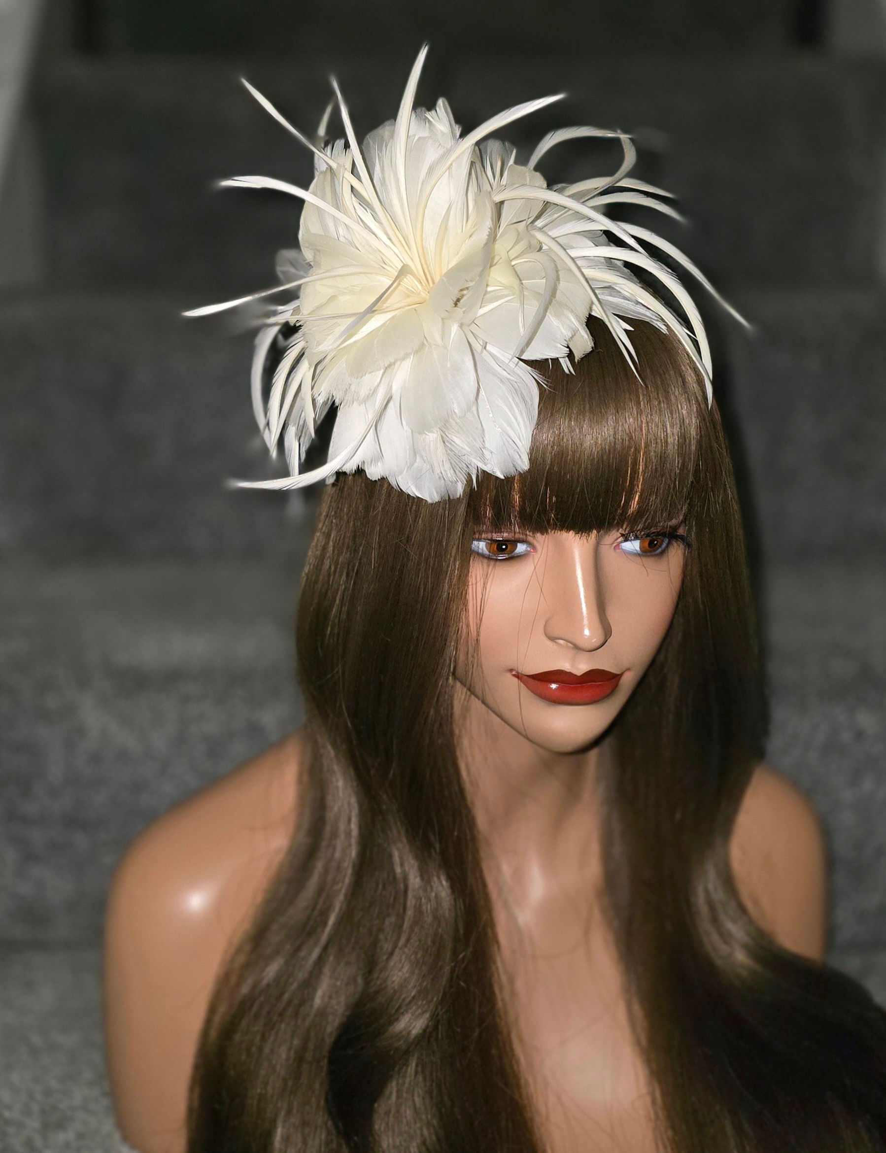 Ivory Feather Fascinator on a band 080126