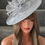 Thumbnail: Silver Grey sinamay Hatinator Hat on a band 090987