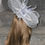 Thumbnail: Silver Grey mesh Fascinator with curled quill on a band 130925