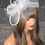 Thumbnail: White mesh Fascinator Hatinator with pearl & diamante on a band 212325