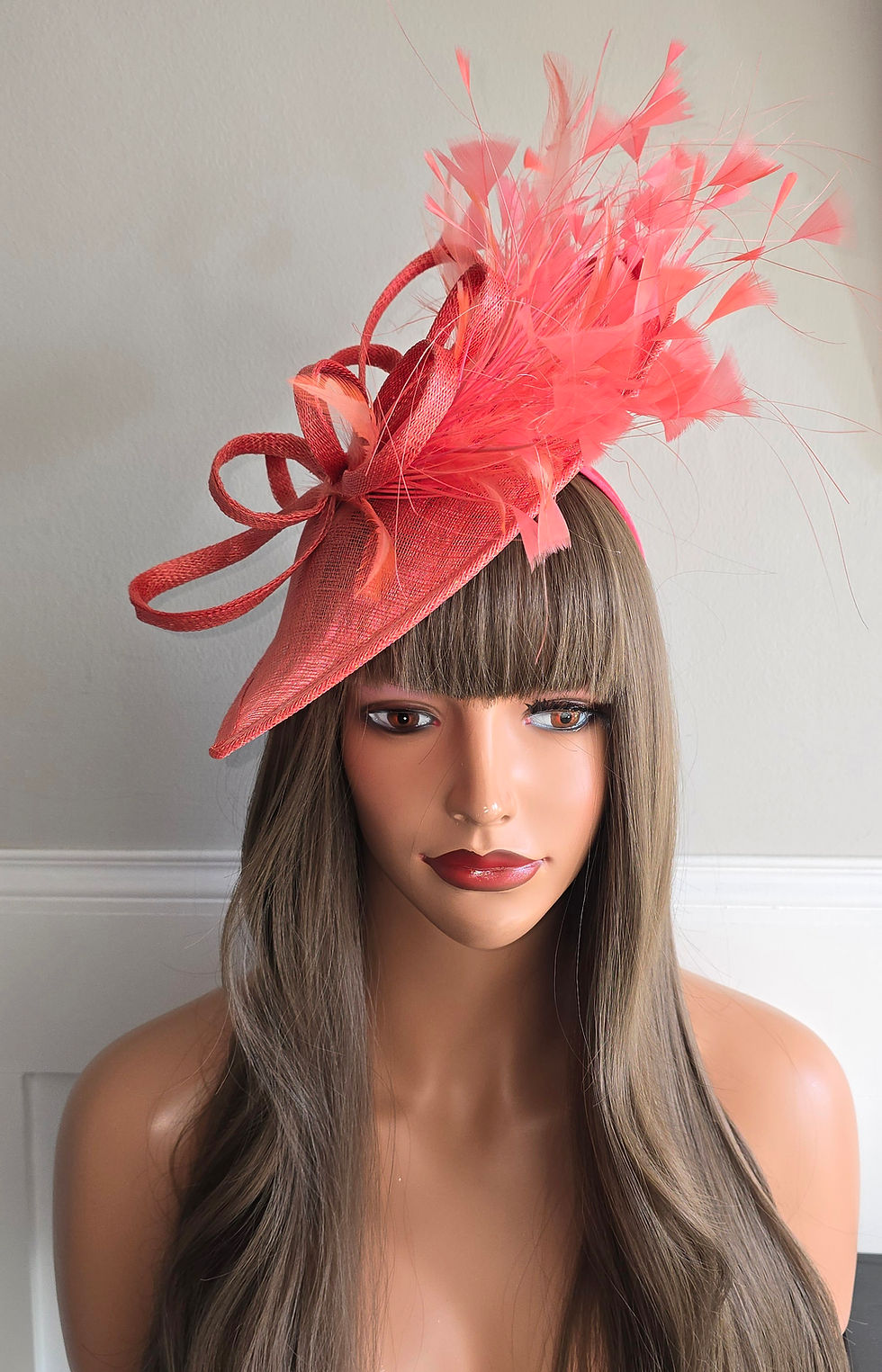 Thumbnail: Coral sinamay Fascinator with feathers in a band 200526