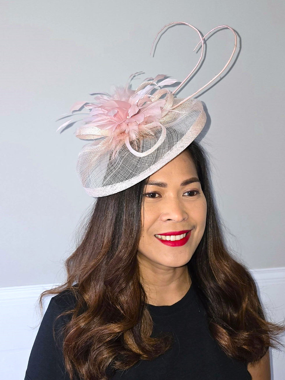 Thumbnail: Light Pink sinamay Fascinator on a band with 2 curled Quills 090125