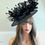 Thumbnail: Black sinamay Hatinator Hat with floaty feathers on a band 080925