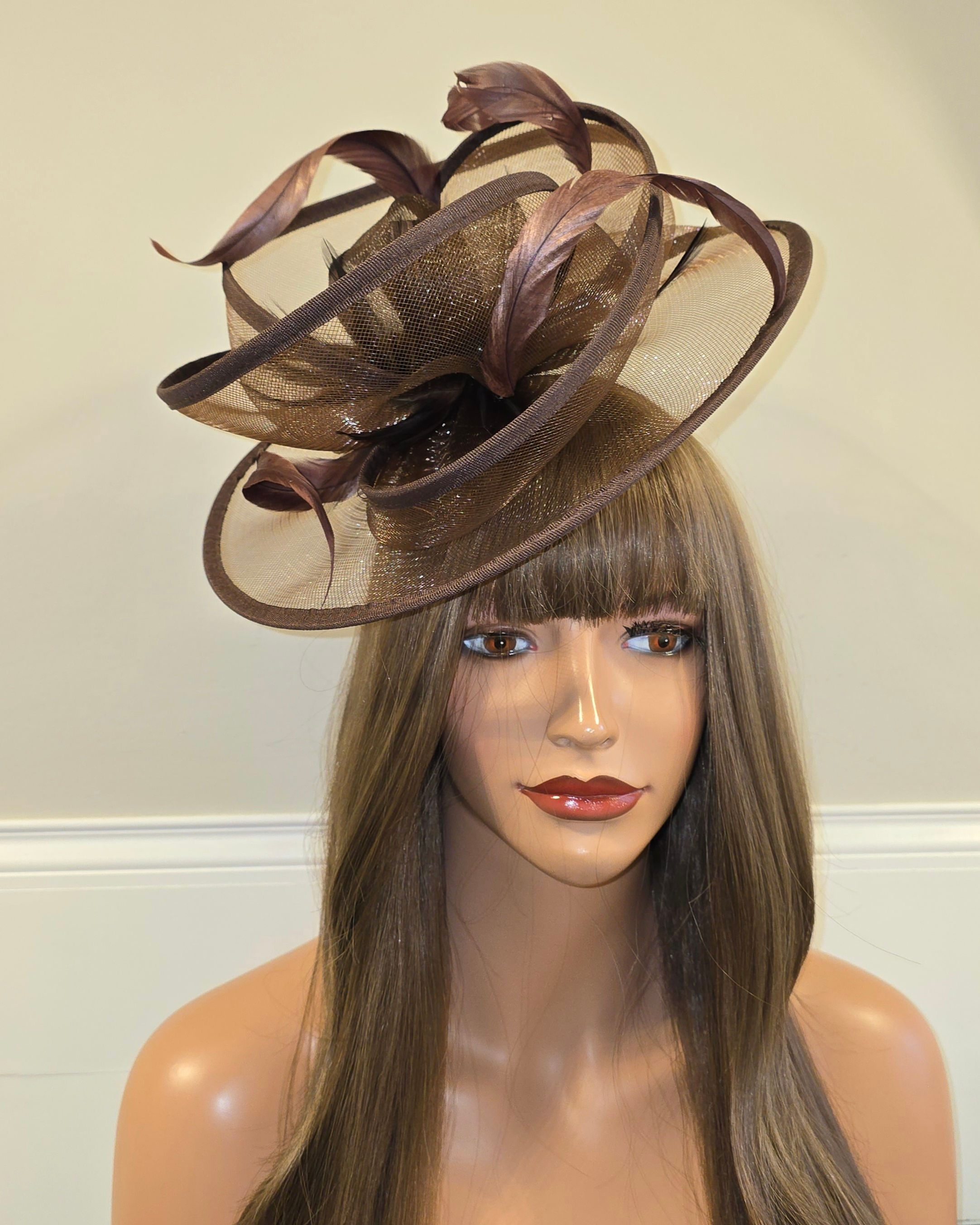 Brown mesh Fascinator edged in satin on a band