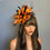 Thumbnail: Black & Orange organza Fascinator with quill Feathers on a band 160125