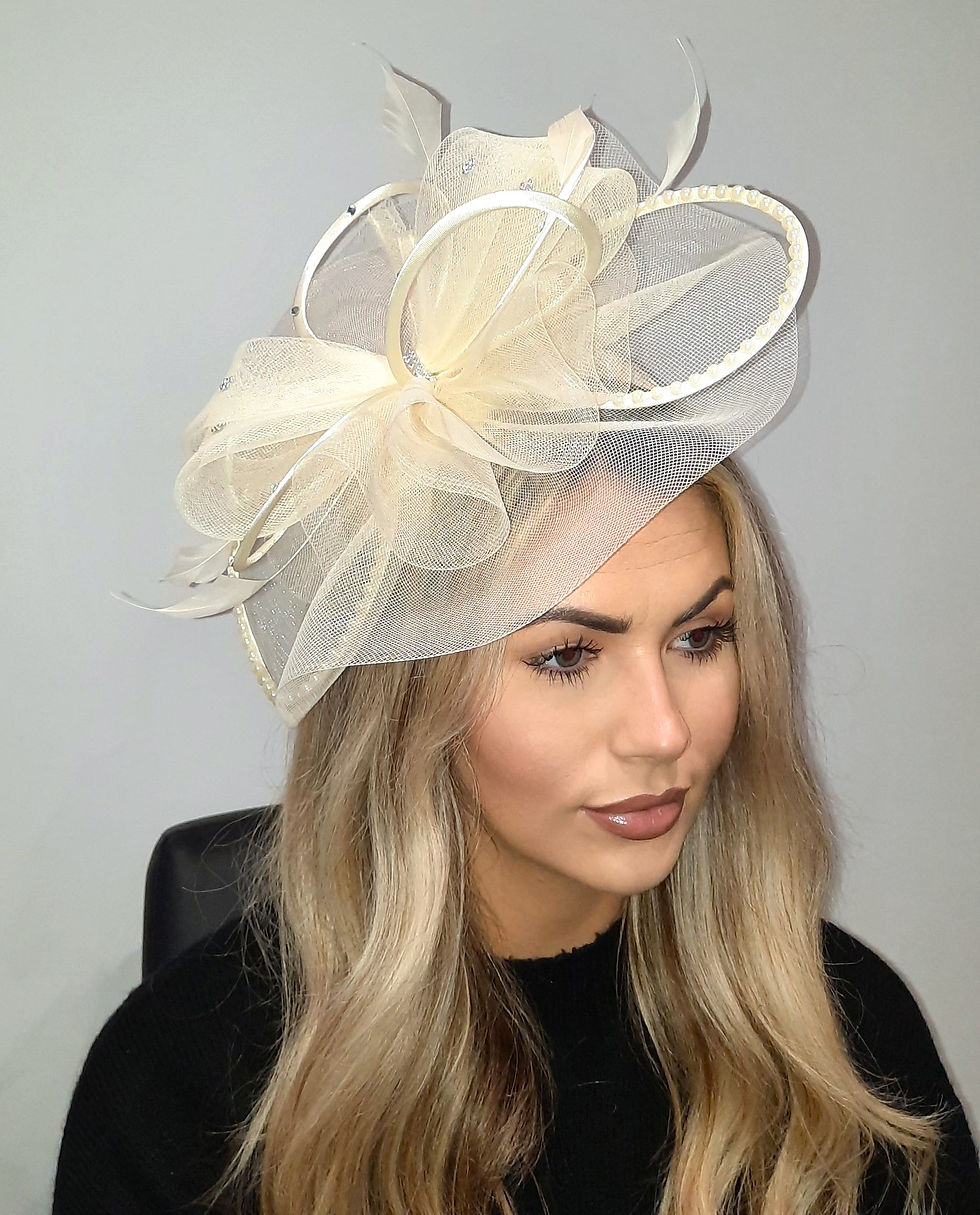 Thumbnail: Cream mesh Fascinator with Pearls, Diamante and satin loops on a band 130224