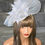 Thumbnail: Silver Grey mesh Fascinator with curled quill on a band 130925