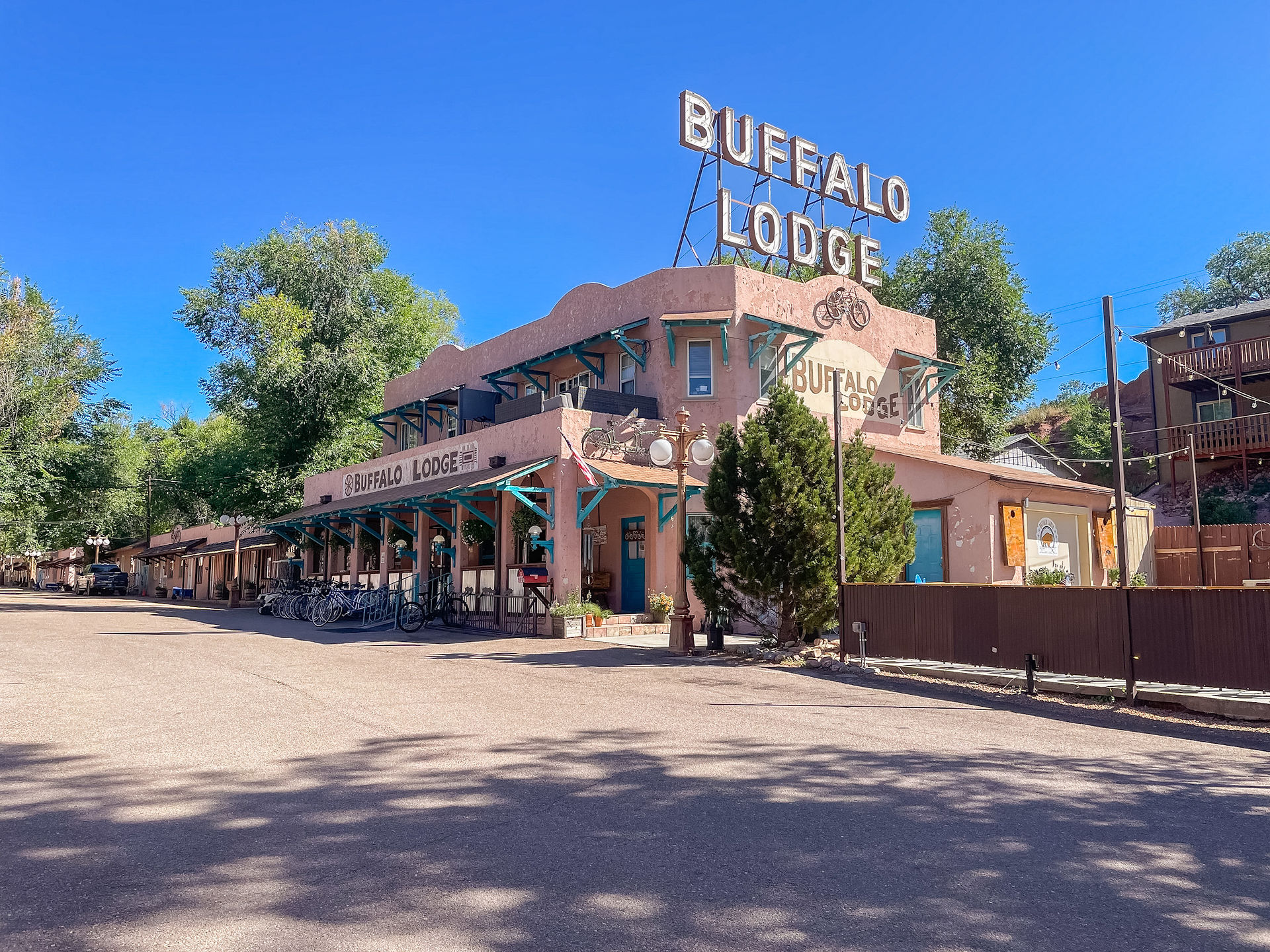 Exterior of the Buffalo Lodge Main building on a beautiful blue sky day.