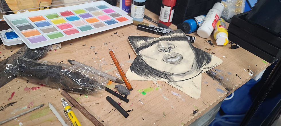 Esperanza's messy art and painting space