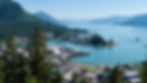Mouth of the Stikine River in Wrangell, Alaska. Alaskan town with houses, harbor and spruce trees.