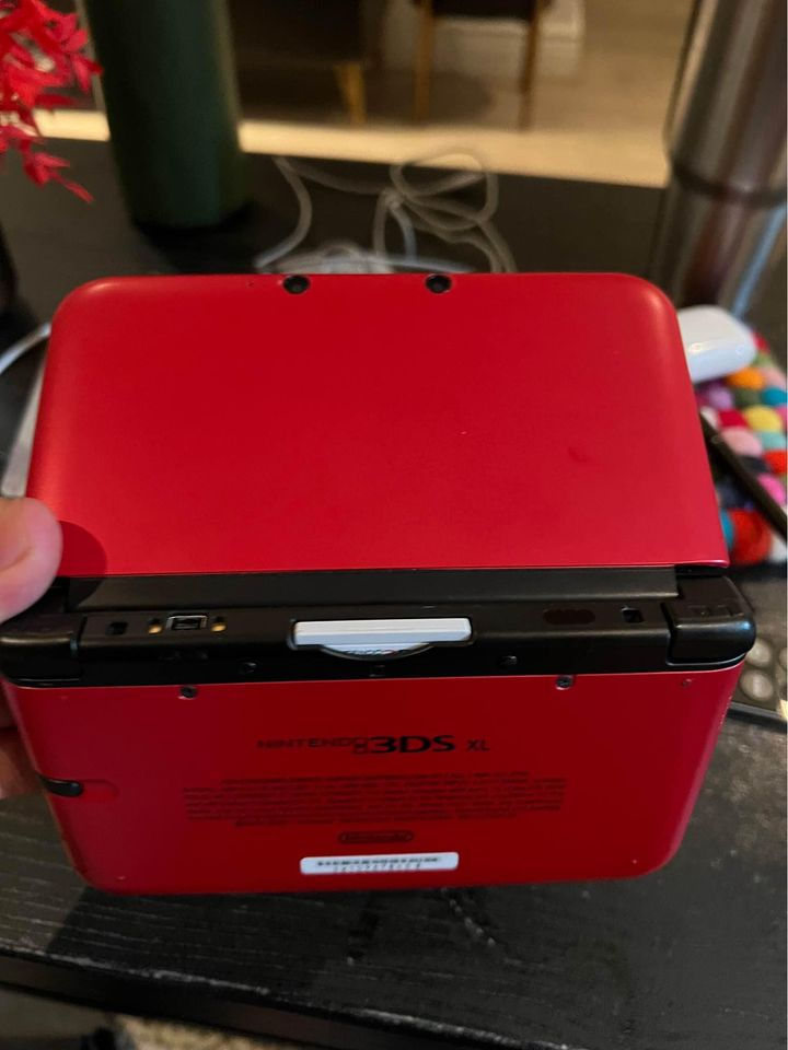 Thumbnail: Nintendo 3ds console - red, with charger, and case