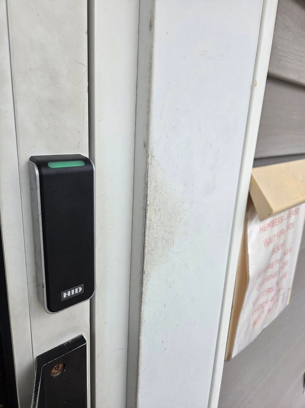 Brivo access control keypad reader installed on a commercial office door in Connecticut by DetectionTech