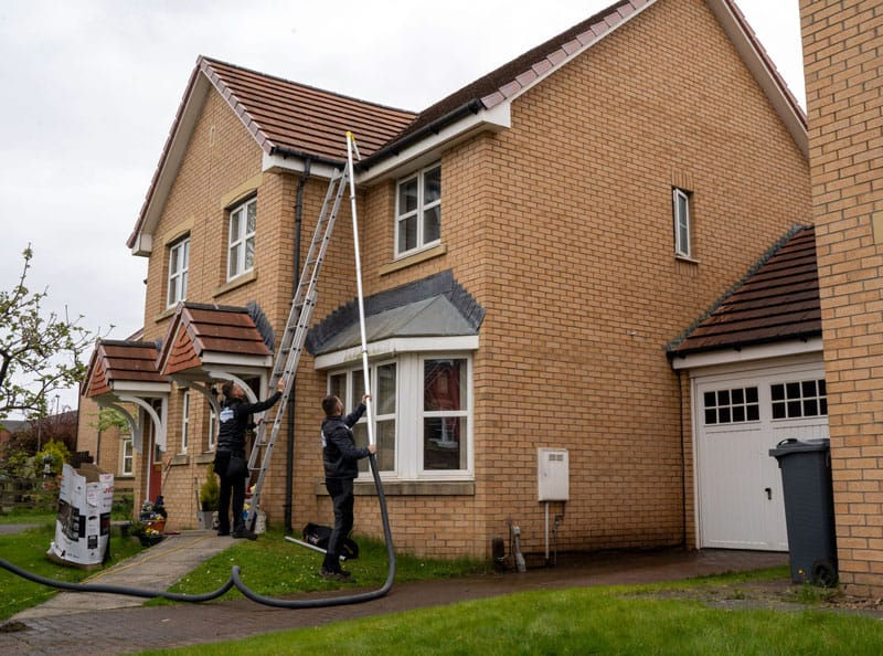 ProShine cleaning detached home guttering.jpg