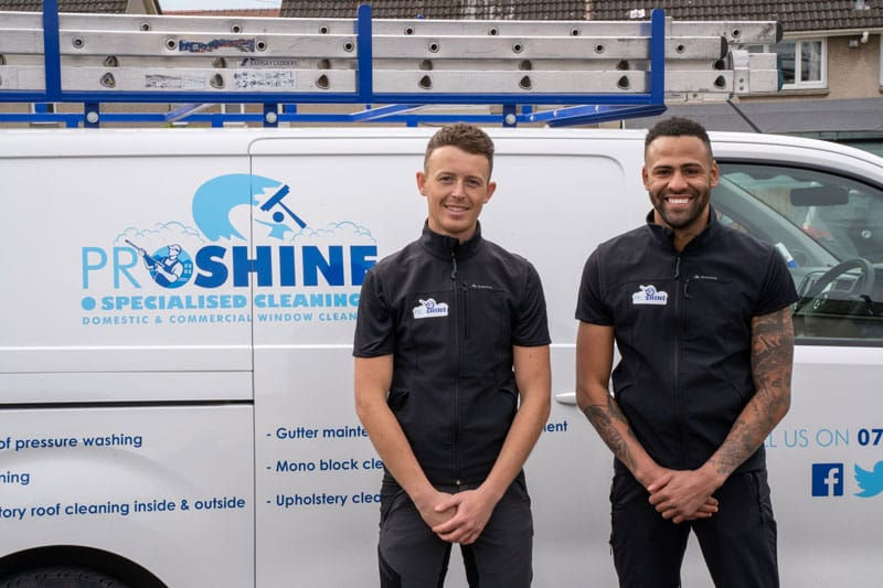 Pro-shine team members posing next to van.jpg