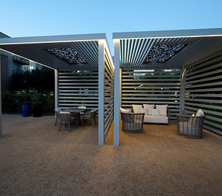 Commercial Box Frame Lattice with Deco Panel and Privacy Wall- Night with Lights.jpg