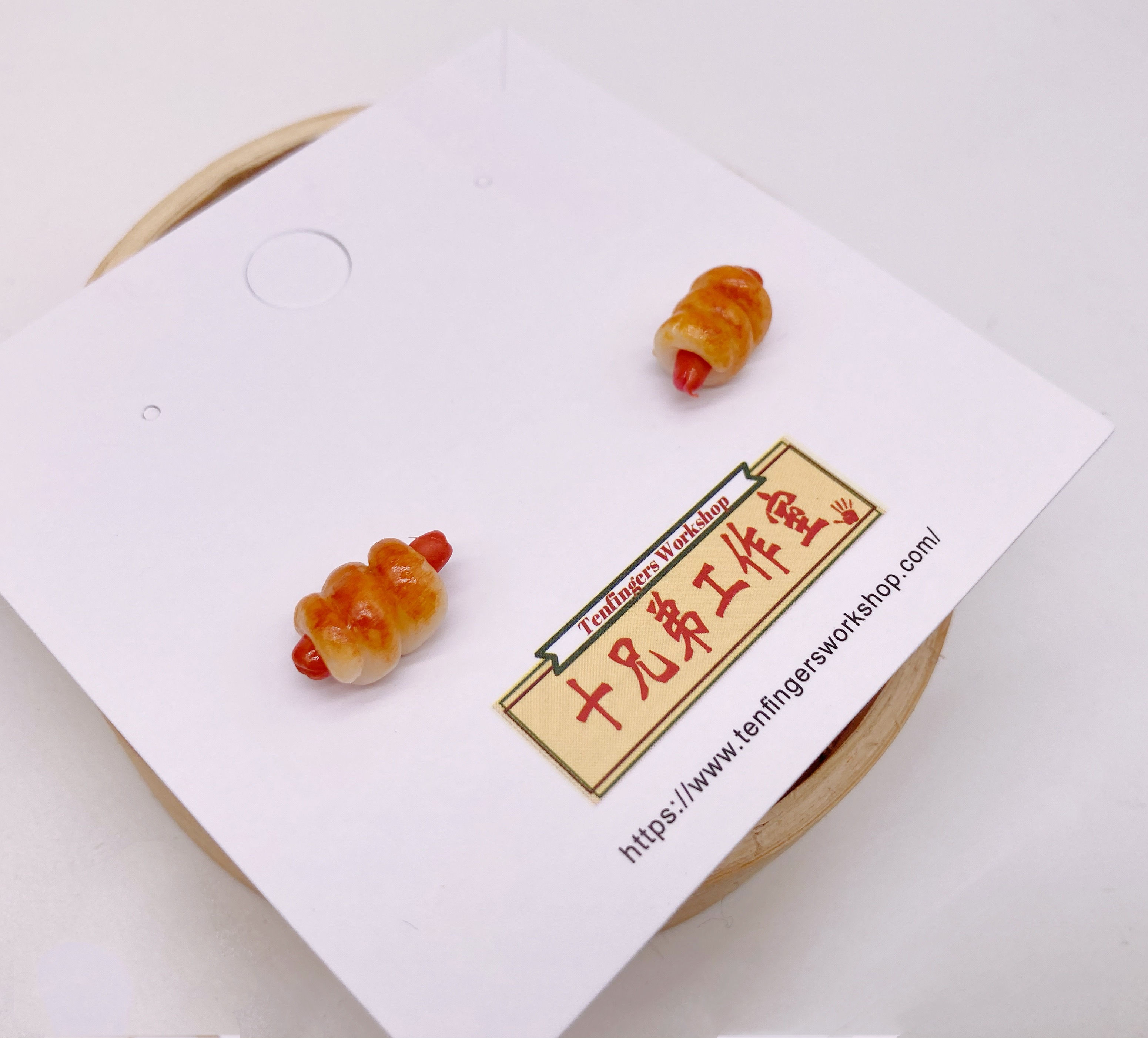 Earrings in Saurage Bun Design