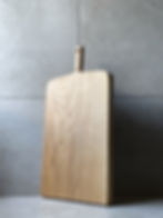 Medium carved oak chopping board with handle