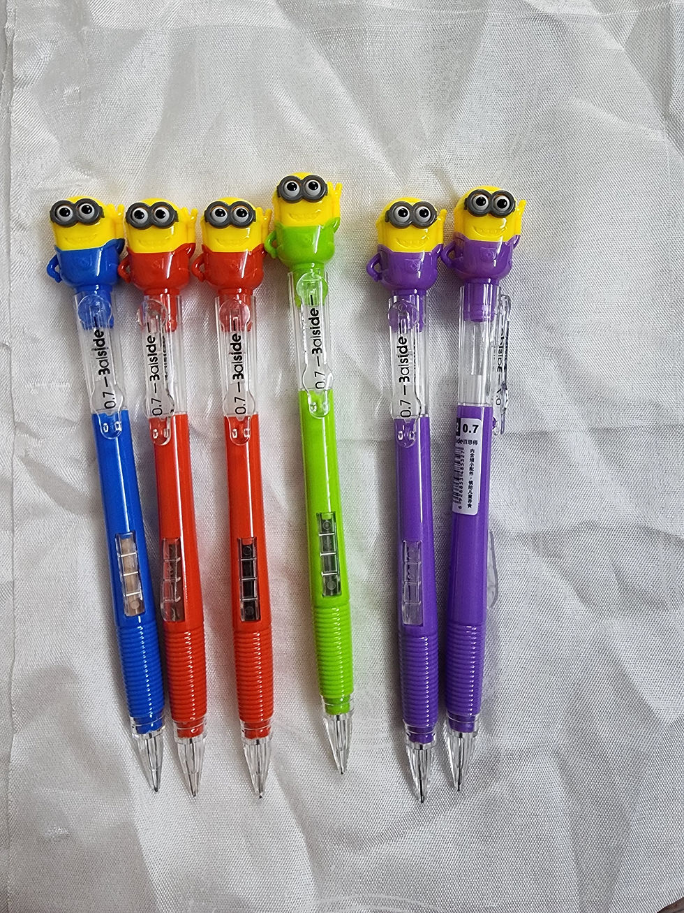 Colorful Minion topper mechanical pencils with 0.7mm lead in assorted shades.
