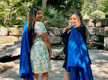 two-teachers-cap-and-gown.jpg
