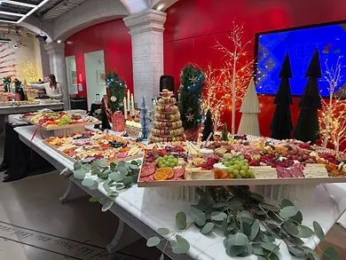 Luxury holiday grazing tables with artisan charcuterie, premium cheeses and festive catering for corporate celebrations.