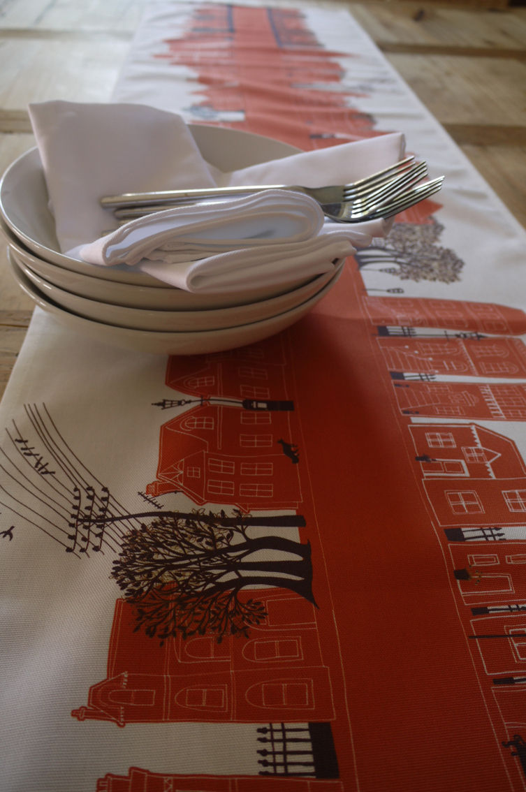 Miniature : Burnt Orange Table Runner, depicting homes, trees and people walking down the road