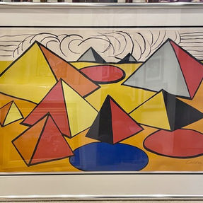 Compositions with Pyramids, Circles and Clouds 1970 by Alexander Calder is a color lithograph. One of the most collected Mid Century Masters, Alexander Calder might be best known for his wire mobiles, the artist was also an avid printmaker at the end of his career. Featuring primary colors, geometric lines and spirals, and flattened biomorphic shapes, the imagery in his lithographs is often reminiscent of his sculptural work. While many of his prints may initially appear abstract, a closer look will reveal symbols of people, plants, and animals.